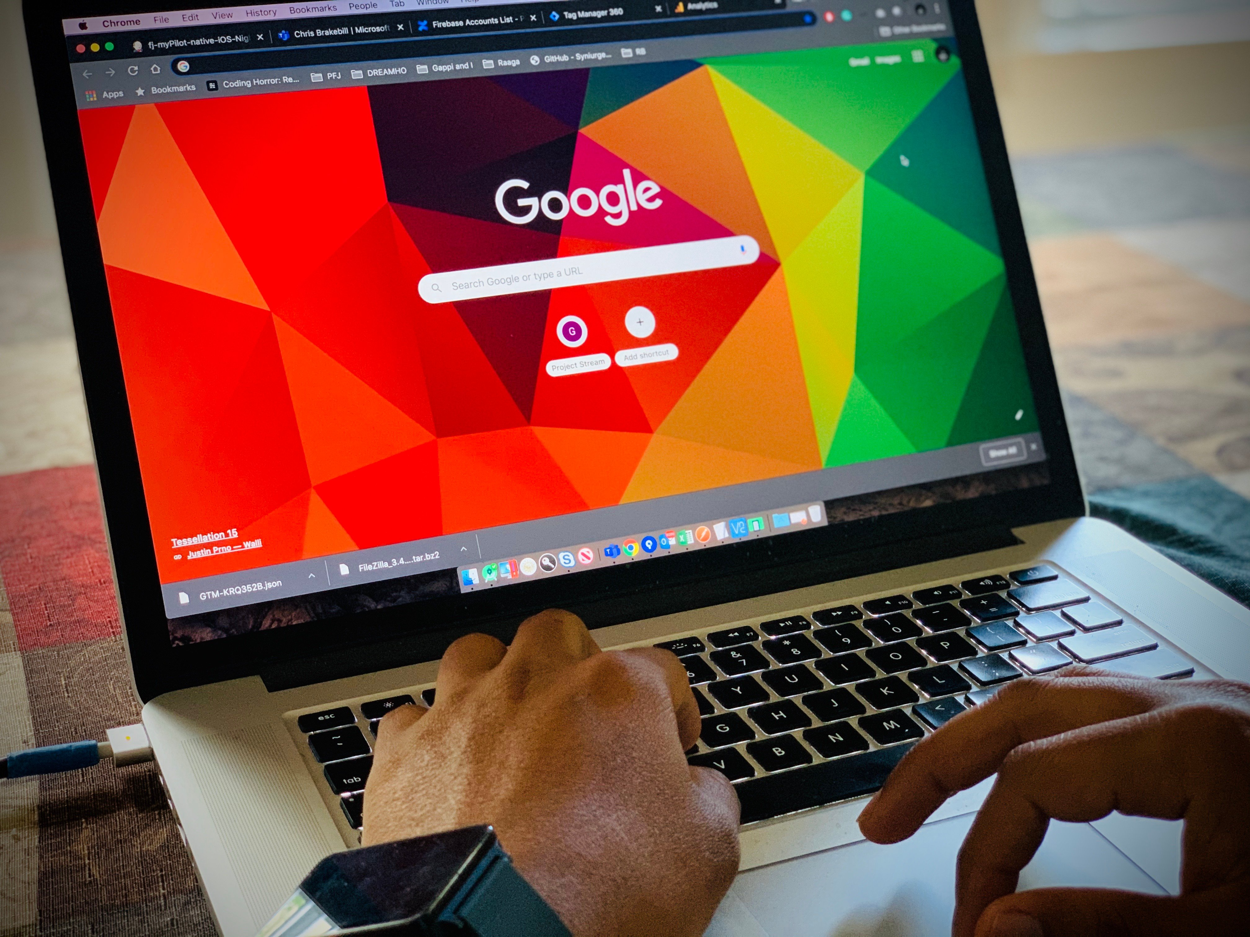 Someone using the Google search tool on a laptop