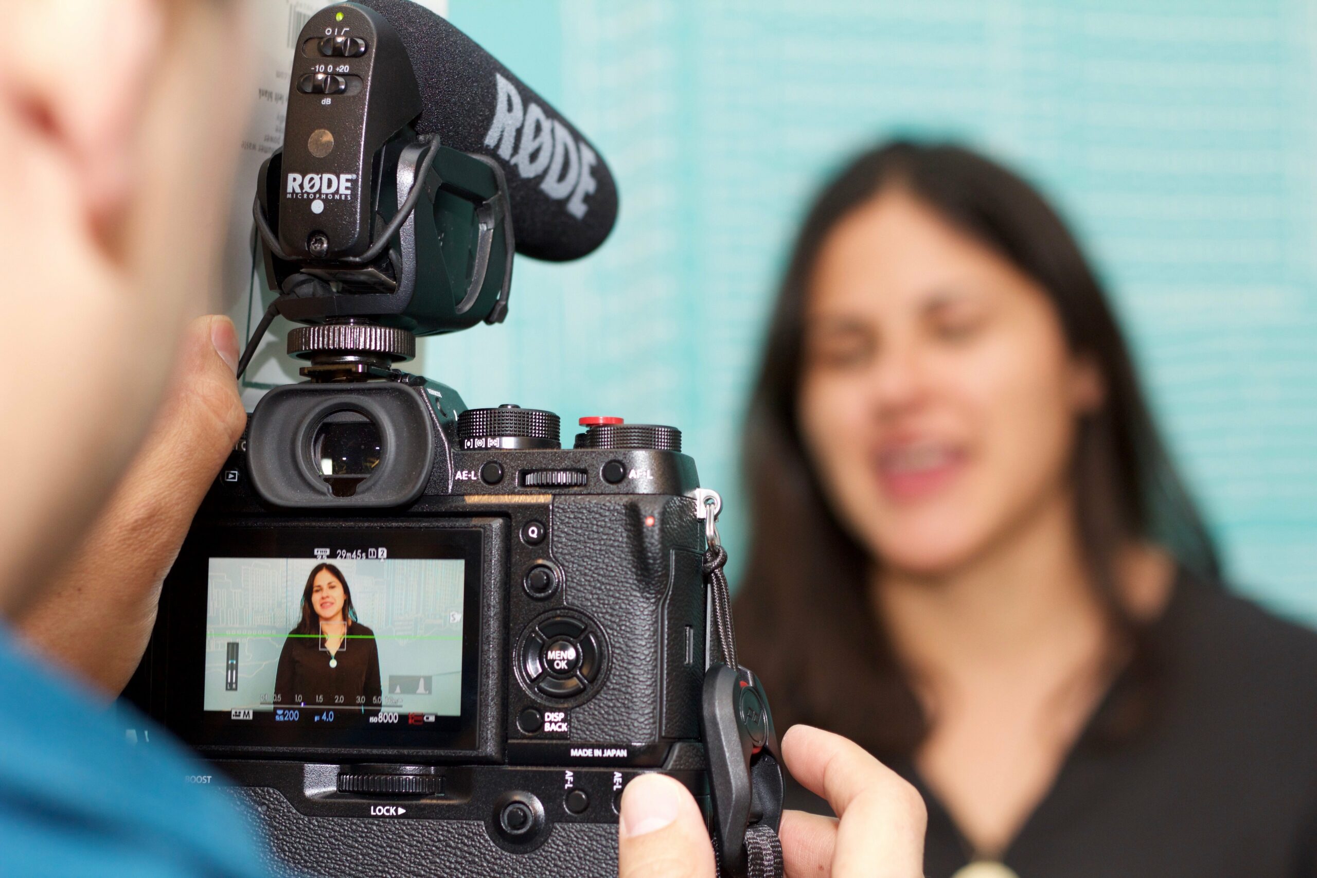 Woman being filmed while talking