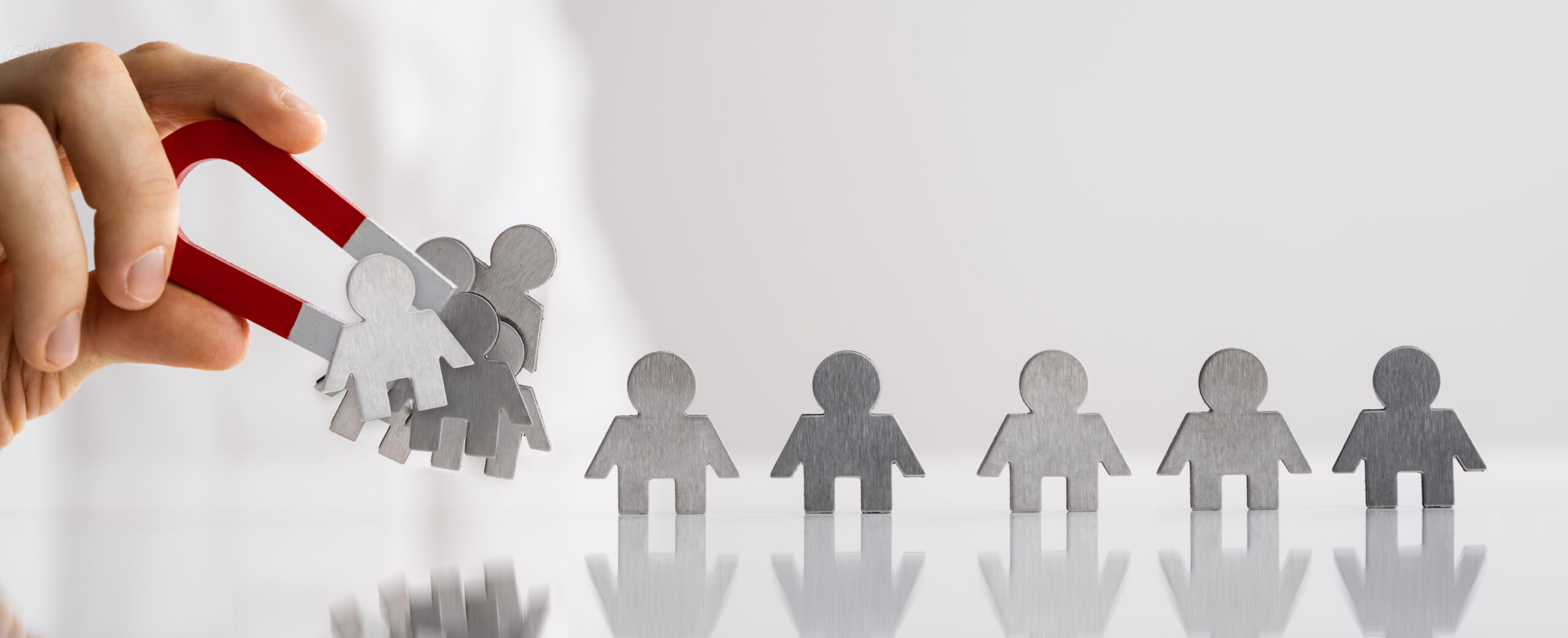 magnet attracting metal cut out peoplemagnet attracting metal cut out people